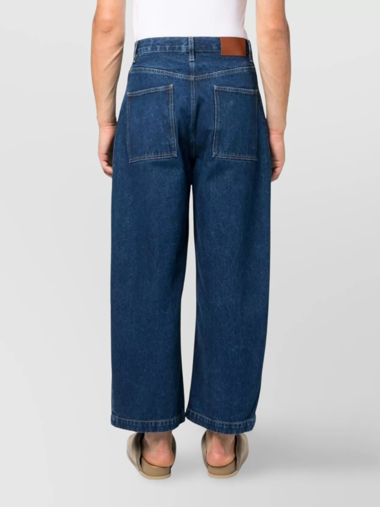 Studio Nicholson Cropped Wide Leg Denim Trousers