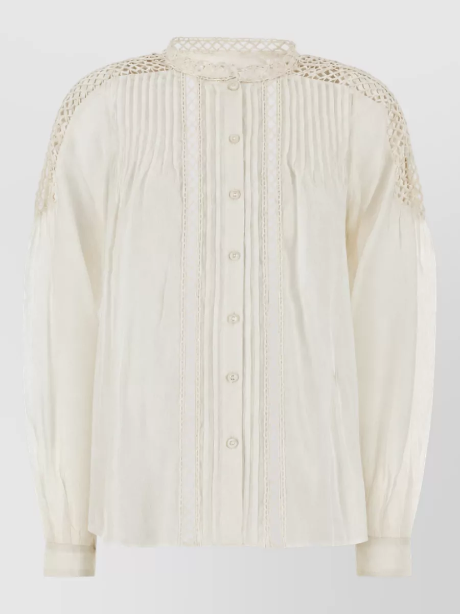 Isabel Marant Etoile Viscose linen blouse — The ivory crochet-trim blouse in K gently calms the skirt’s vivid painterly print while keeping the same romantic boho language and a soft, blouson volume that tucks neatly into the elastic waist.