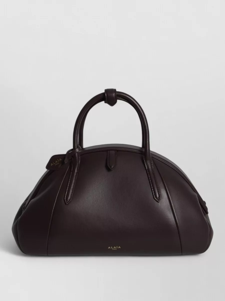Alaïa leather top handle tote bag