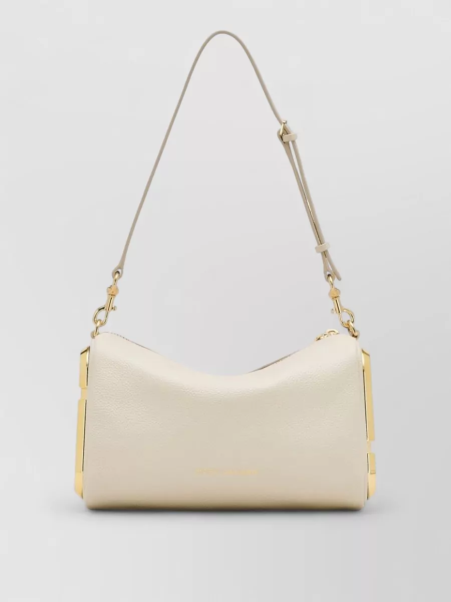 Marc Jacobs the snapshot leather shoulder bag — The sage Furla hobo softly repeats the blazer’s green in a nearby tone, tying the color story together while its structured shape matches the tailored, minimalist aesthetic.