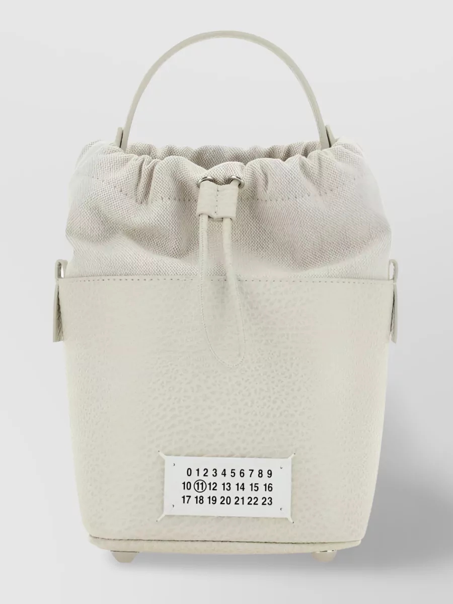 Shop Maison Margiela Drawstring Numbers Patch Bag In Cream
