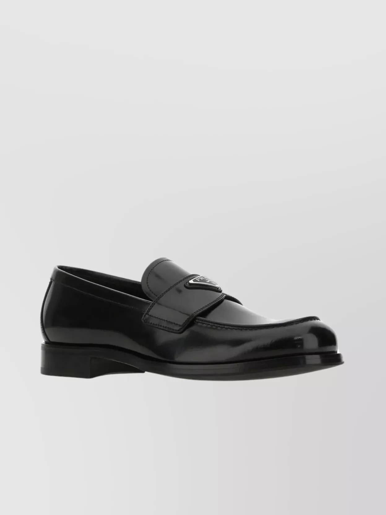 Shop Prada Leather Loafers With Iconic Metal Logo