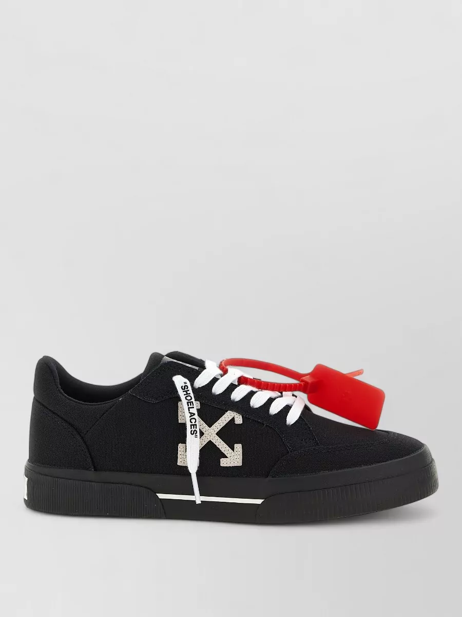 Off-White canvas low-top sneakers