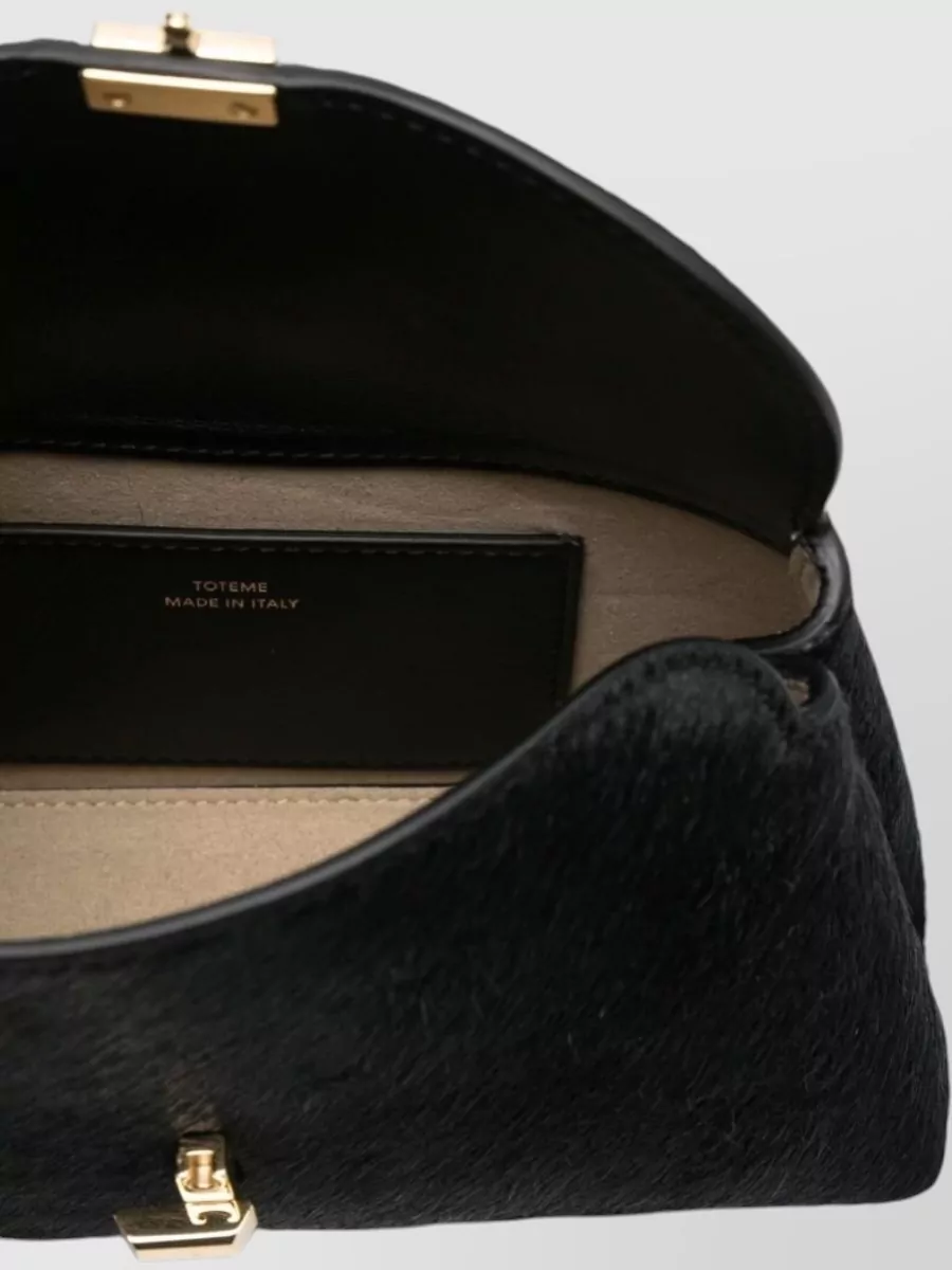 Totême Mini Clutch Bag Curved Silhouette