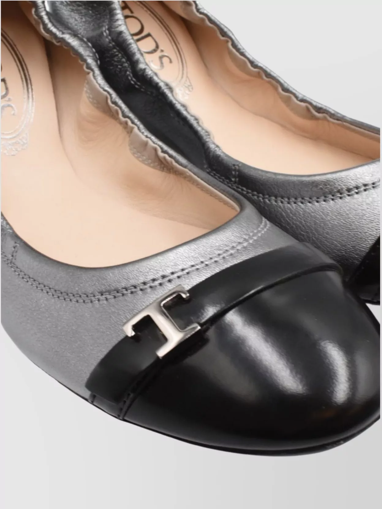 Tod's Cap Toe Metallic Loafers With Rubber Sole