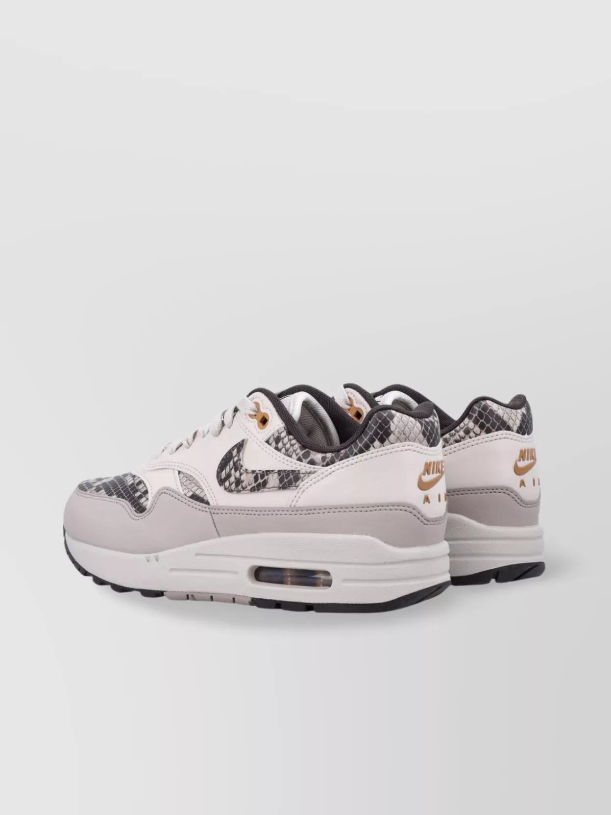 NIKE SNAKESKIN PATTERN LOW-TOP SNEAKERS WITH PADDED COLLAR