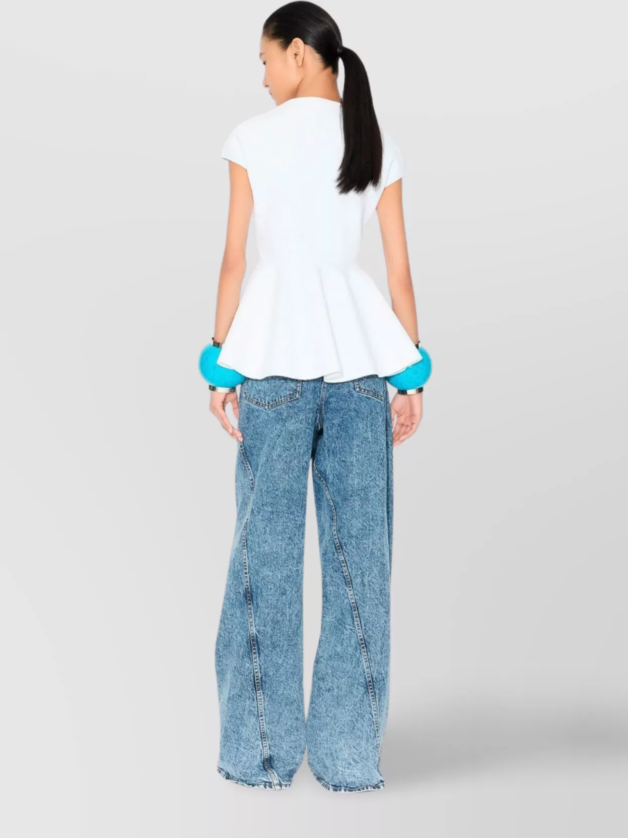 Alaïa Twisted Low Waist Denim Pants In Blue
