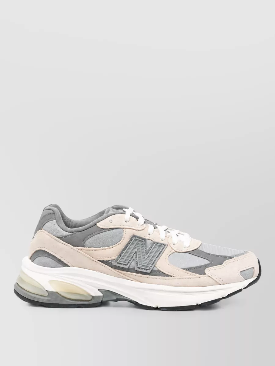 New Balance Paneled Low-Top Sneakers