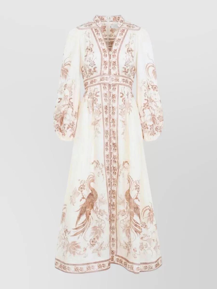 Zimmermann Linen v-neck long-sleeve midi dress — The ivory floral midi with a defined waist and blouson sleeves mirrors the jacket’s romantic tailoring and soft-cream palette, creating a harmonious, occasion-ready column when layered together.