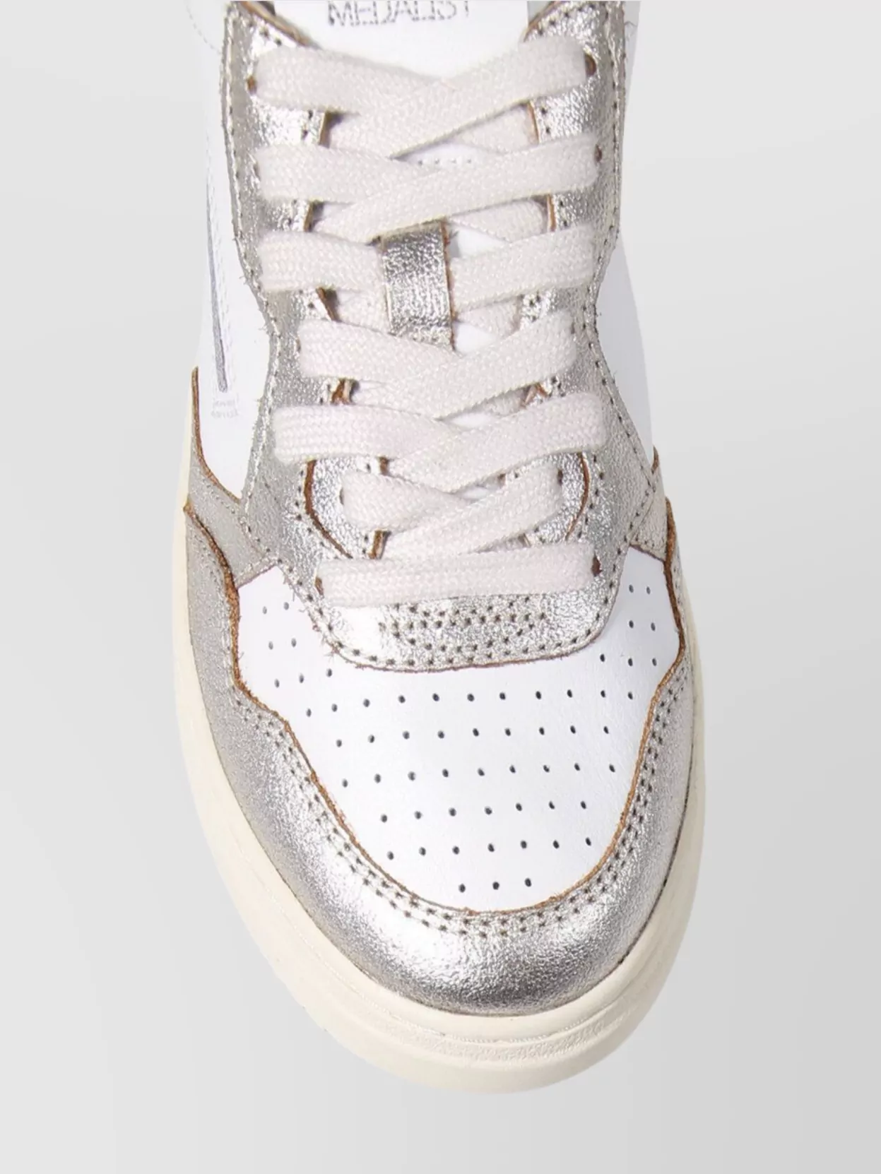 Autry Low Sneaker With Metallic Accents And Perforated Detailing