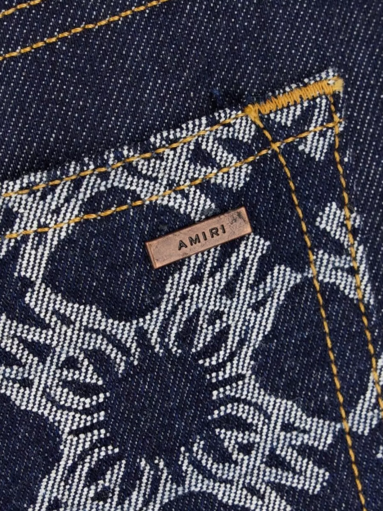 AMIRI BELTED DENIM MINI SKIRT WITH FIVE POCKETS 