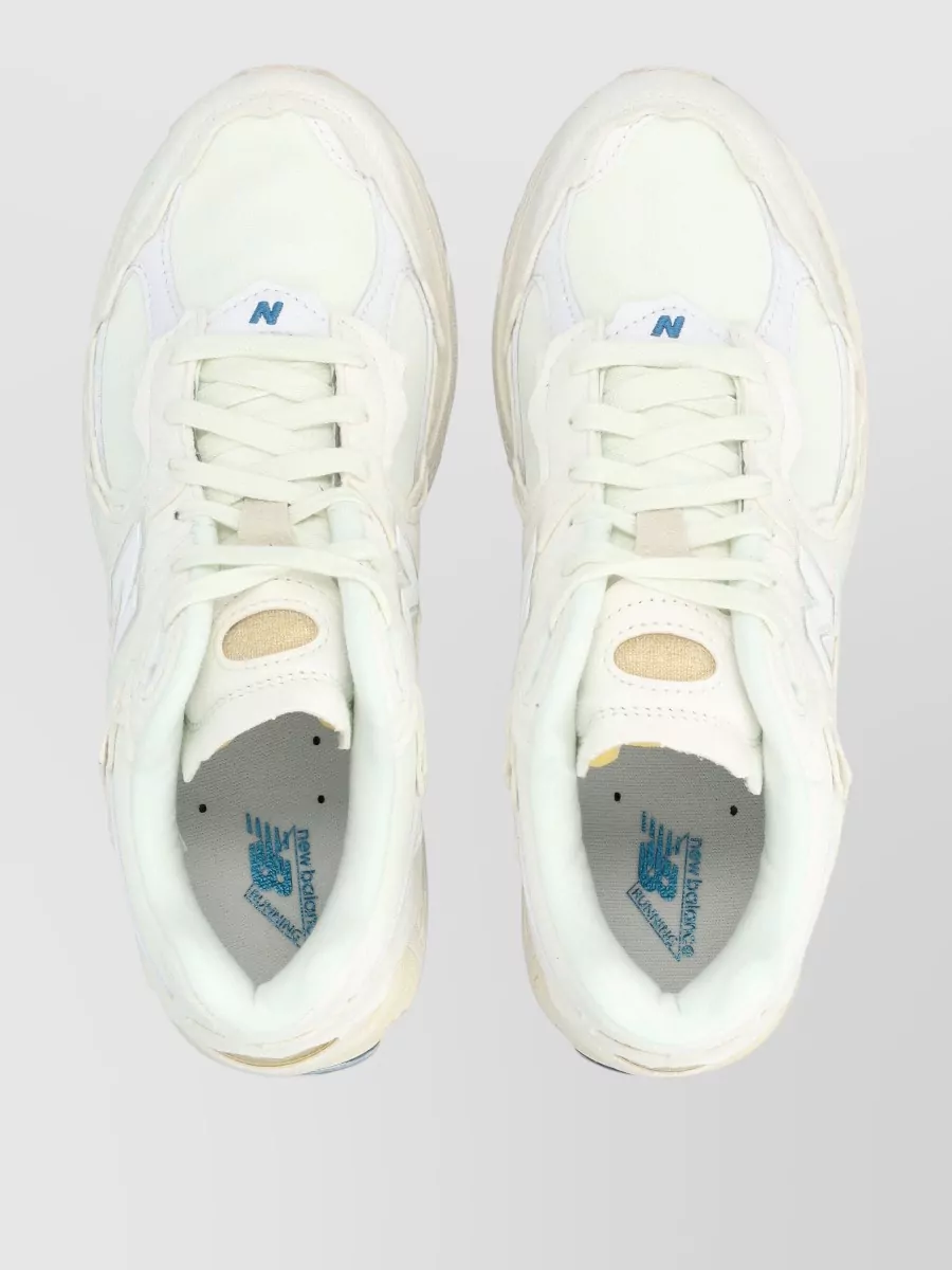 New Balance Suede Low-Top Sneakers