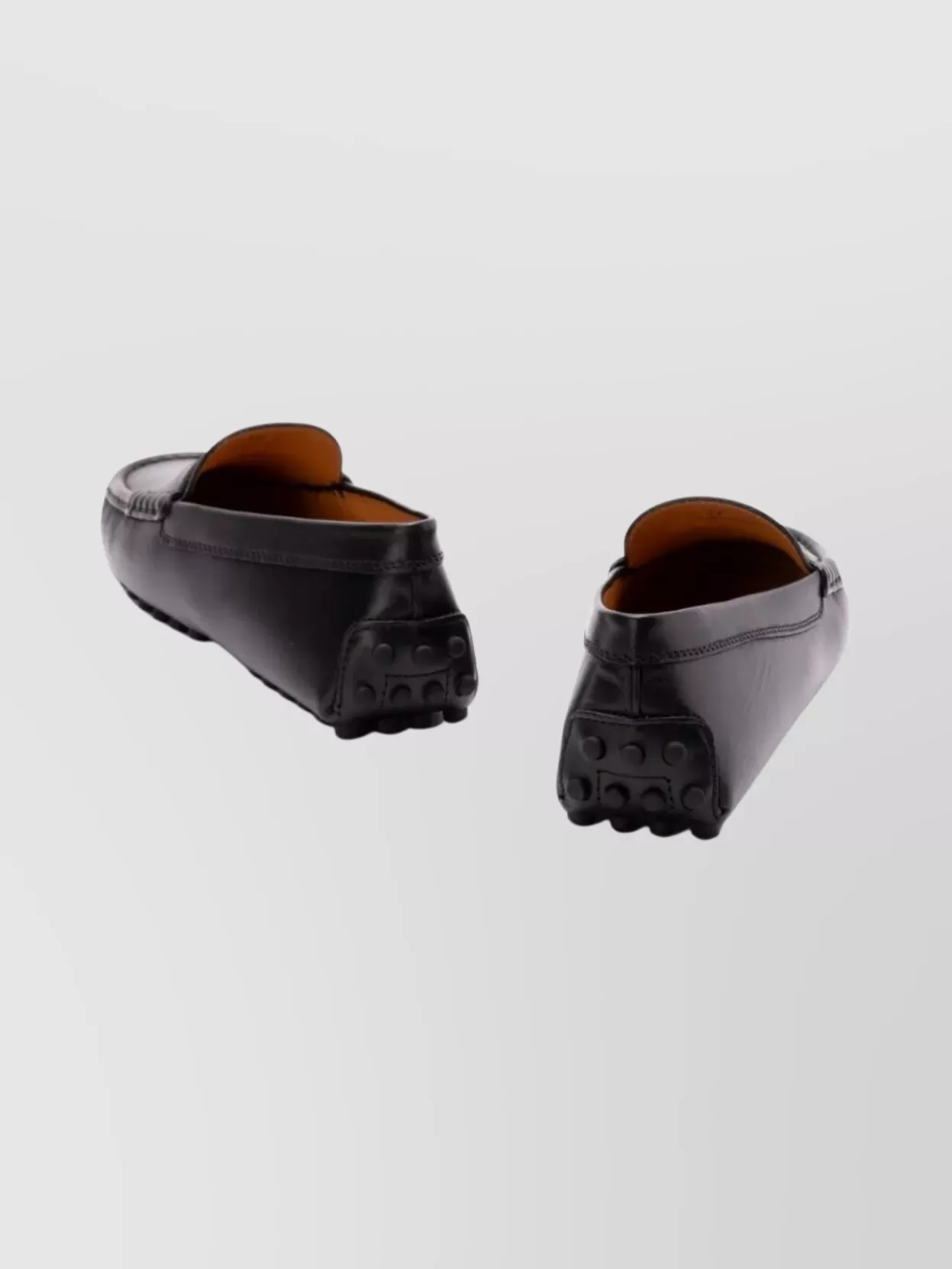 Tod's Round Toe Loafers Featuring Rubber Sole Design
