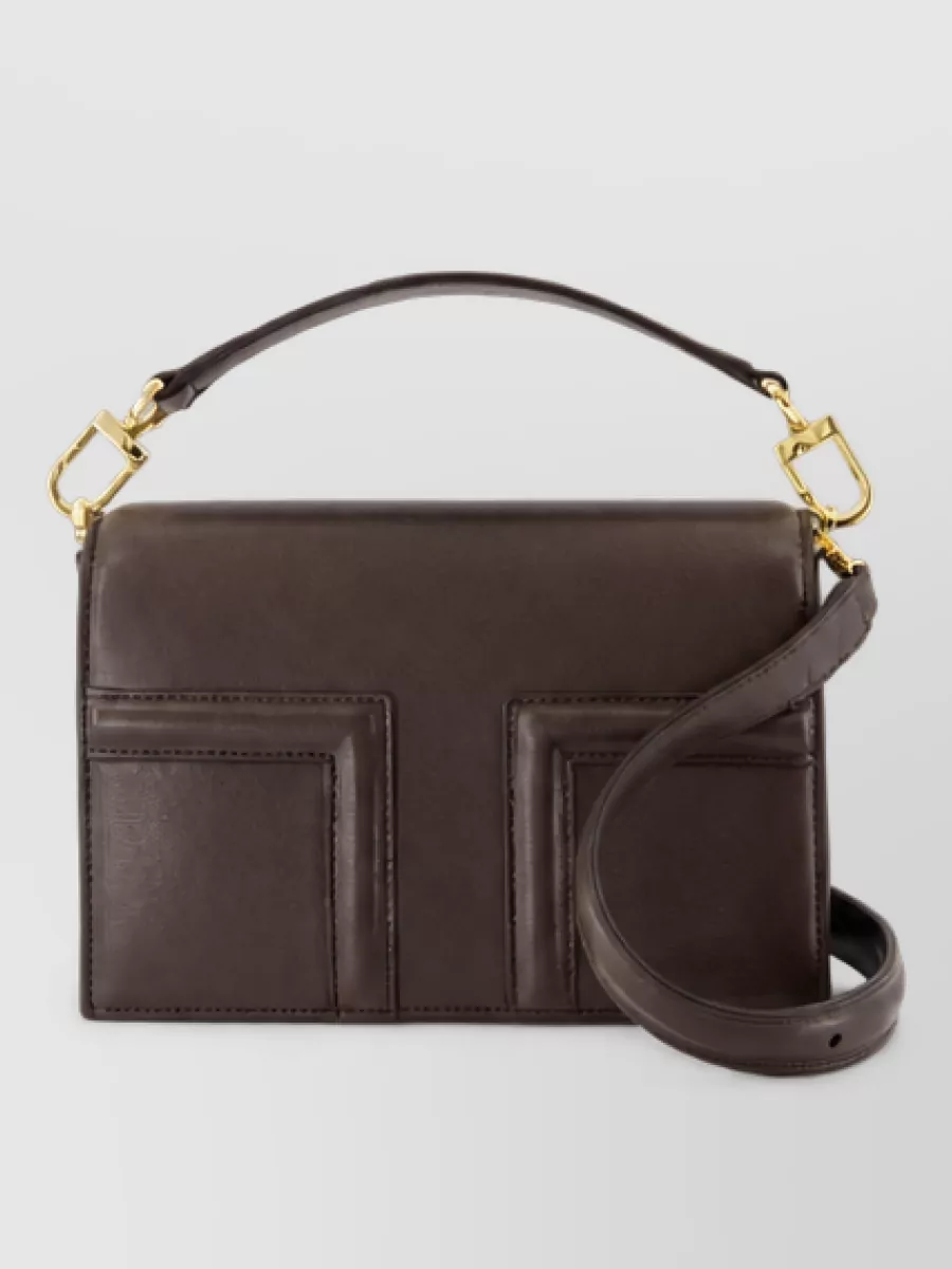 Totême leather mini clutch bag