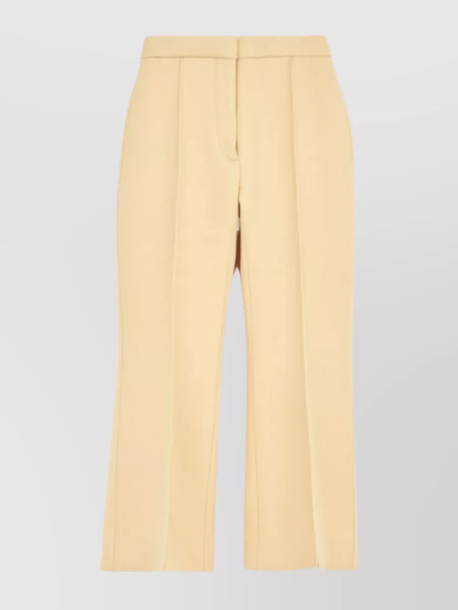 Shop Jil Sander High-waisted Cropped Flared Trousers In Cream