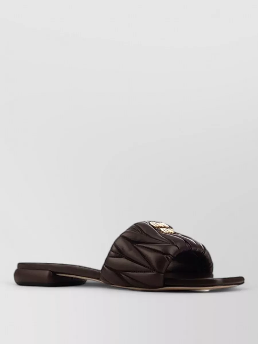 Miu Miu matelassé leather slides