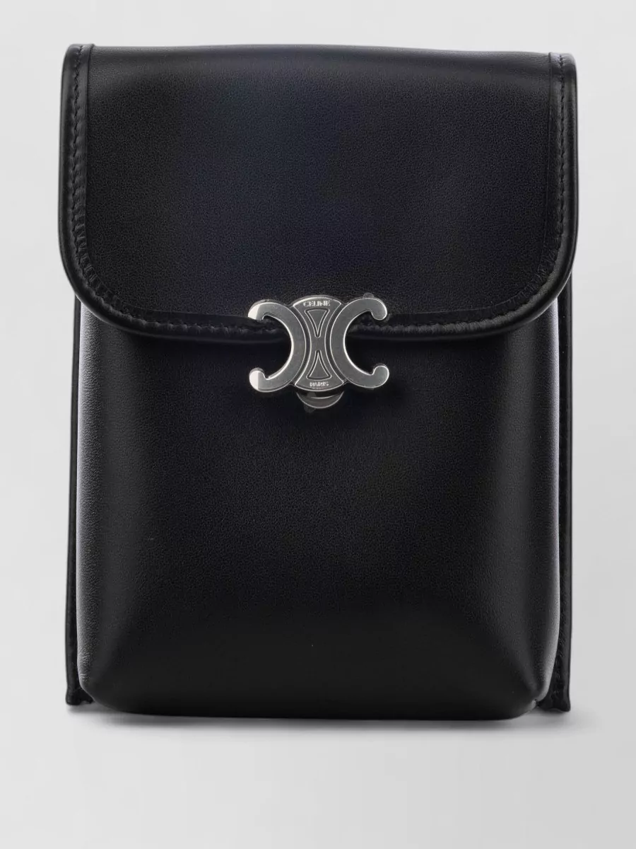 Celine Belt bag — The Celine black leather compact pouch sits quietly at the waist, reinforcing the monochrome, discreetly logoed story without breaking the tailored sophistication of the trousers and loafers.