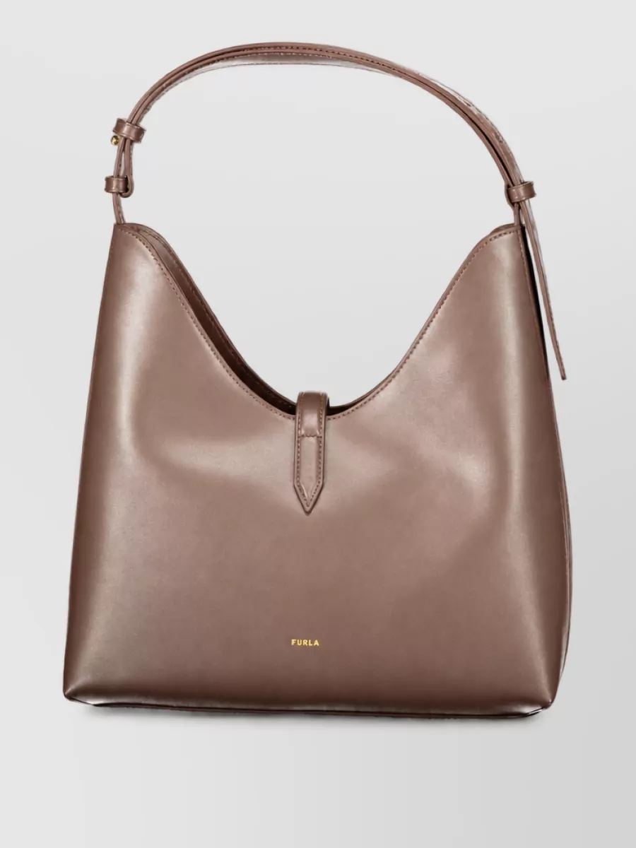 Furla Leather shoulder bag — The taupe Furla hobo matches the jacket’s sophistication and color family, adding a soft structured shape that aligns with the minimalist, quiet luxury mood.