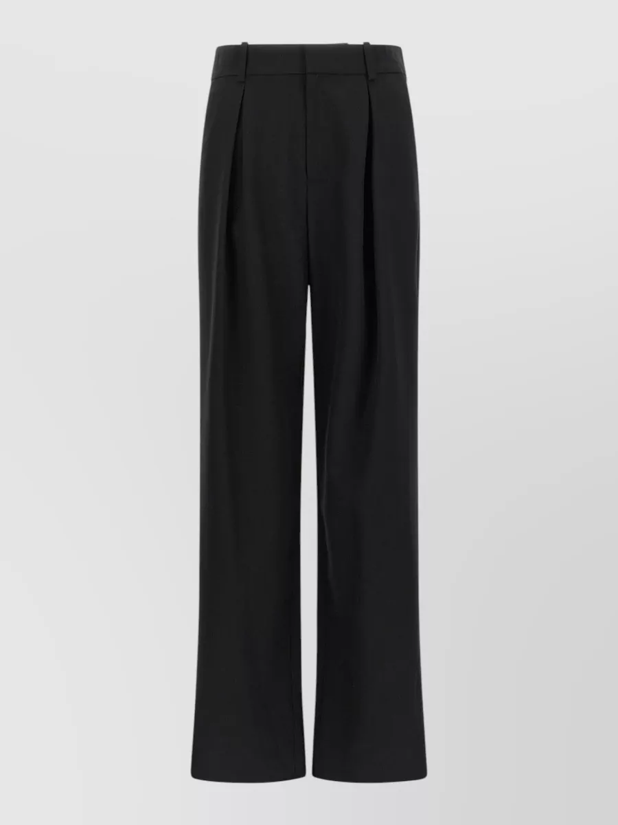 Mm6 Maison Margiela High-rise wide-leg trousers — The high-rise black wide-leg trouser creates a clean, elongated column that grounds the camel bodysuit with quiet, tailored polish and keeps the palette minimal and modern.