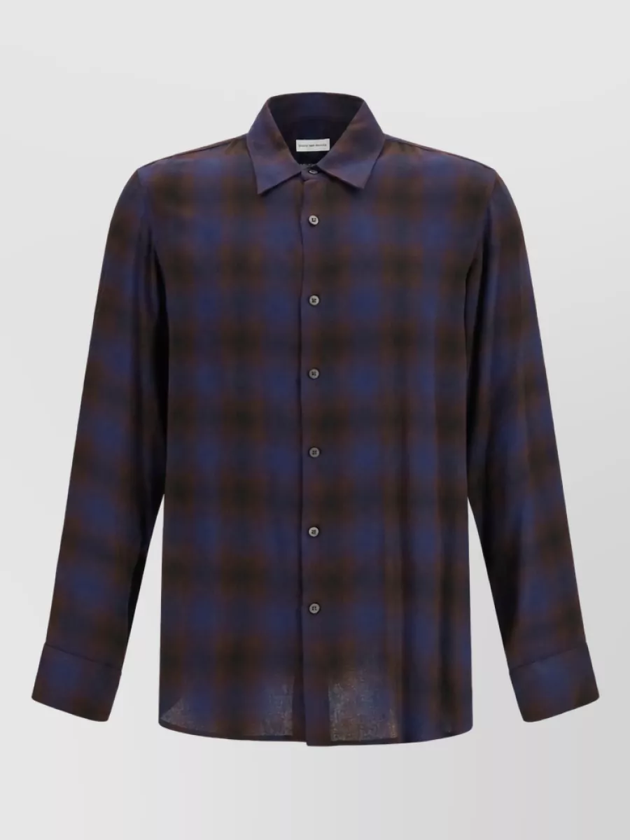 Dries Van Noten Checked shirt — The matching blurred-check shirt in the same inky navy and brown as the trouser creates a quietly luxurious, fluid co-ord that keeps the wide-leg silhouette intentional rather than sloppy.