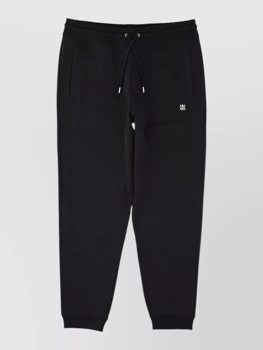 Hugo track pants