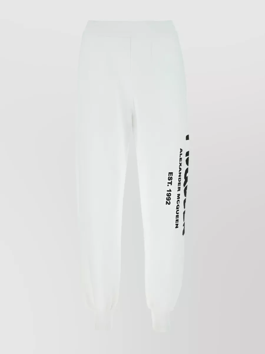 Shop Alexander Mcqueen Logo-print Tapered Track Pants In Black