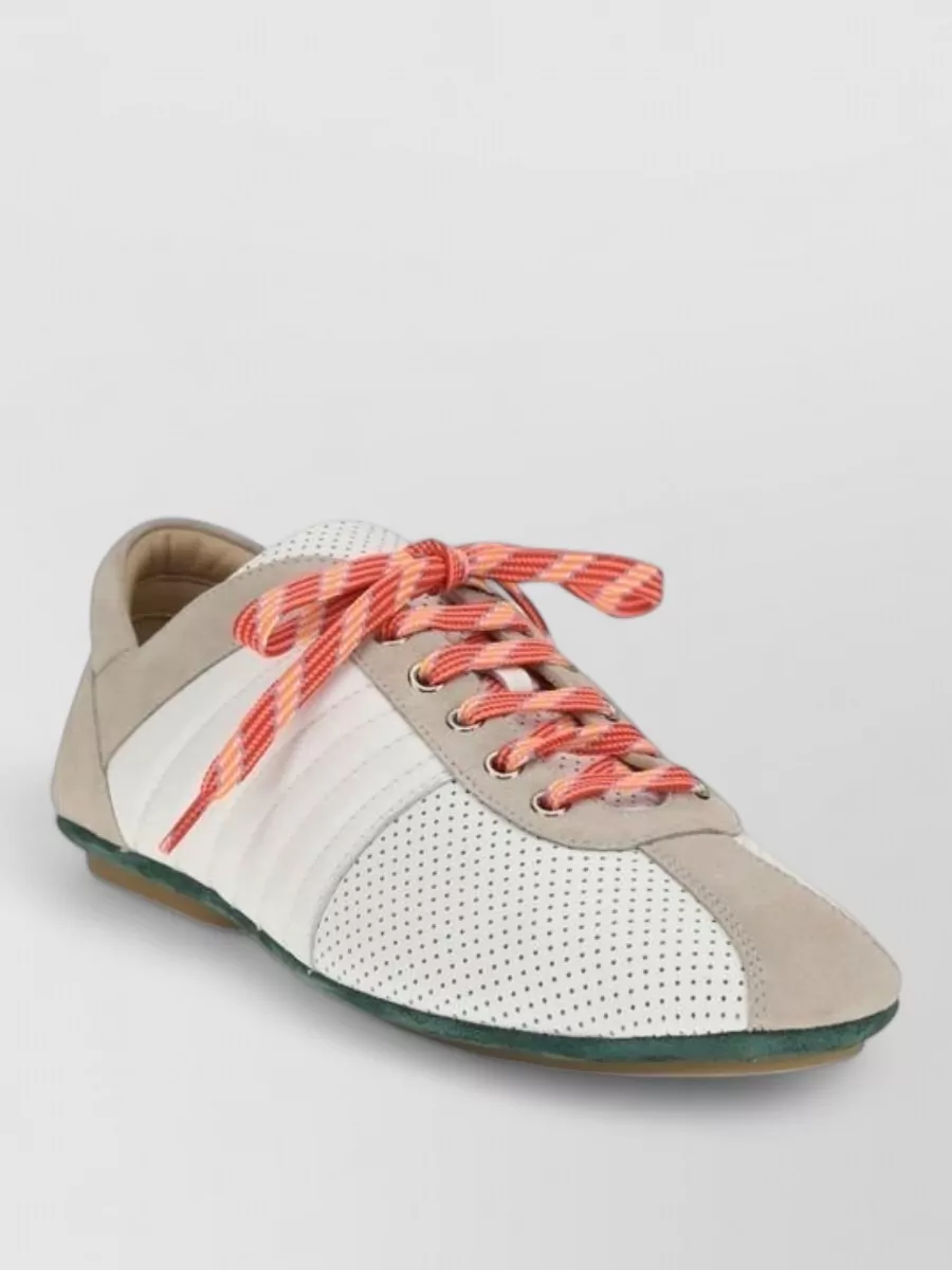 Valentino Garavani Calf leather perforated low-top sneakers