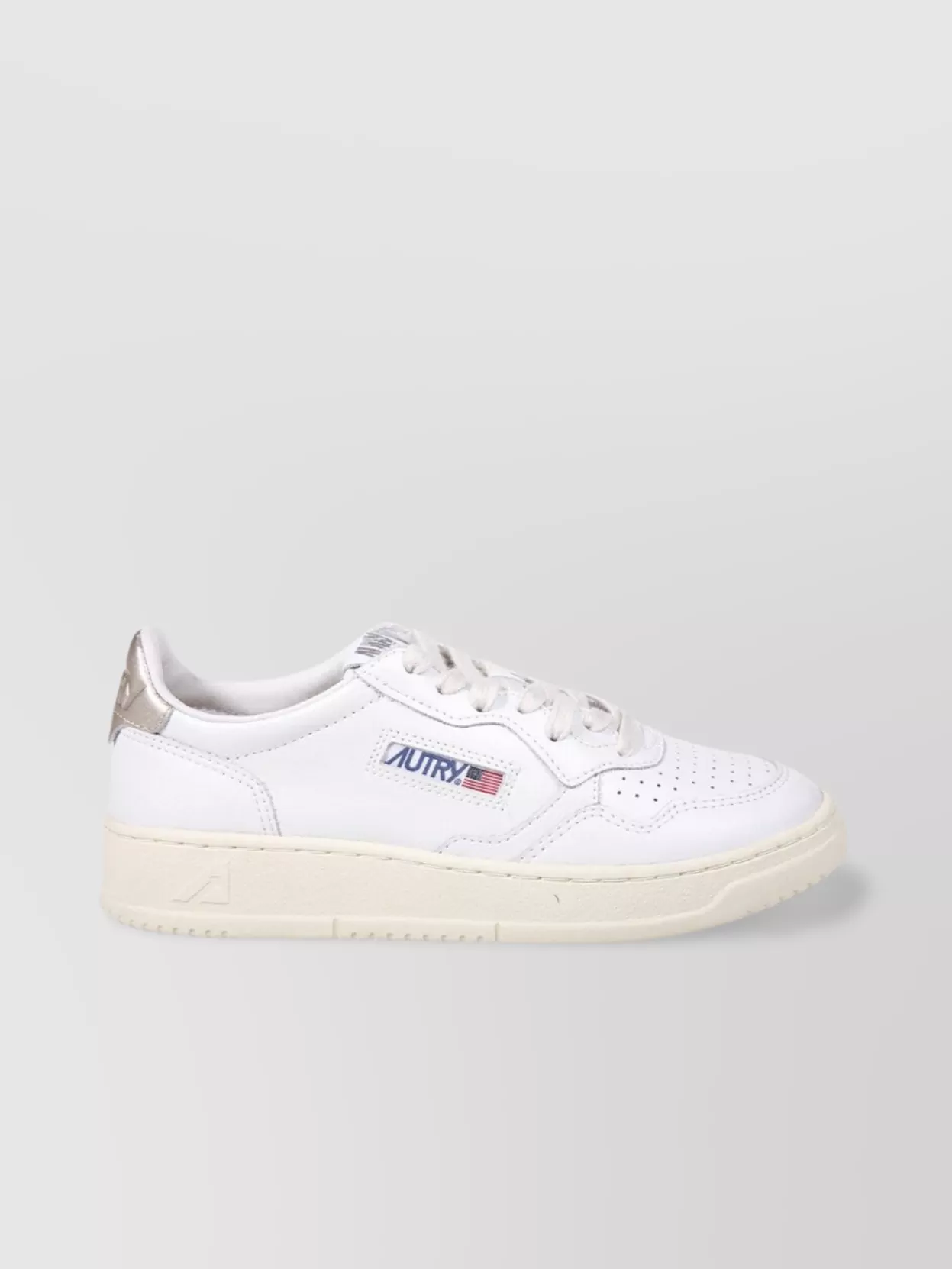 Autry Low Top Rubber Sole Sneaker With Perforated Detailing In White