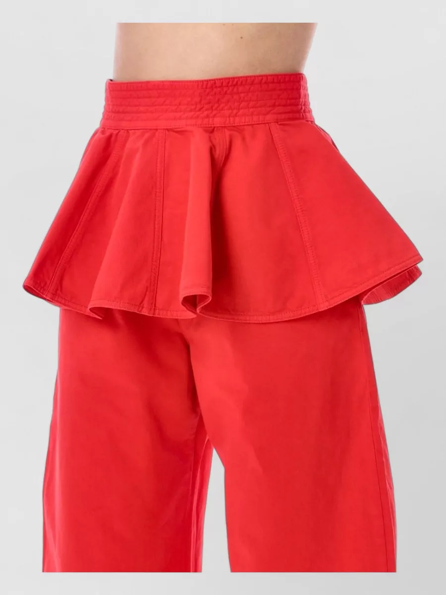 Alaïa Peplum Belt Tinted Denim