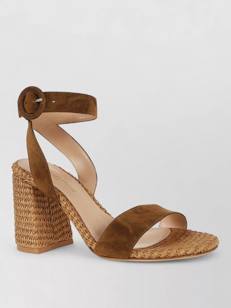 Gianvito Rossi Leather luana sandals — The Gianvito Rossi tan suede and raffia block-heel sandal echoes the dress’s boho-romantic mood, works for garden-party formality, and visually grounds the maxi length with a stable, leg-lengthening heel.