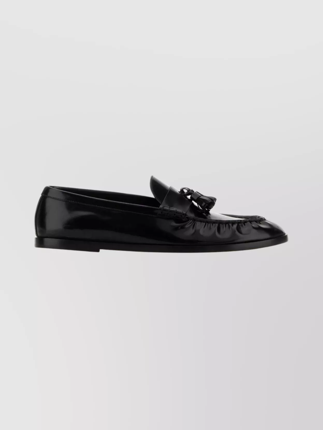 The Row Flat Sole Leather Loafers Featuring Tassel Detail In Black
