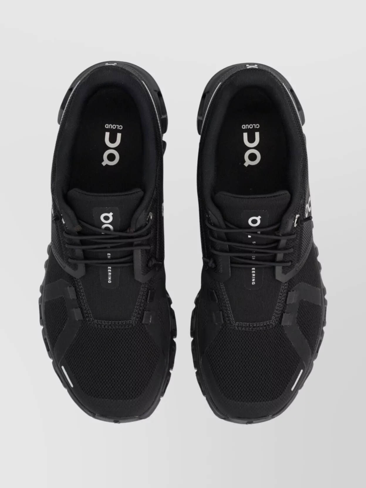 On Lightweight Mesh Sneakers Featuring Reflective Accents