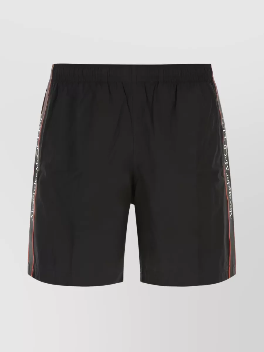 Shop Alexander Mcqueen Logo-tape Elastic Waist Swim Shorts In Black
