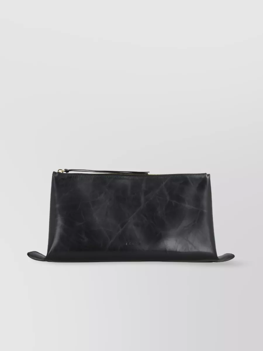 Shop Jil Sander Embossed Logo Clutch Bag In Black