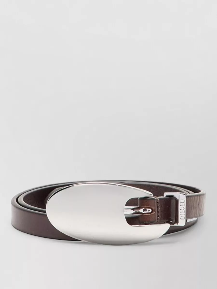 Diesel Leather belt — The slim black Diesel belt with tonal logo gives just enough definition at the high waist, tying in with the black boots and bag while keeping the styling clean and minimal.