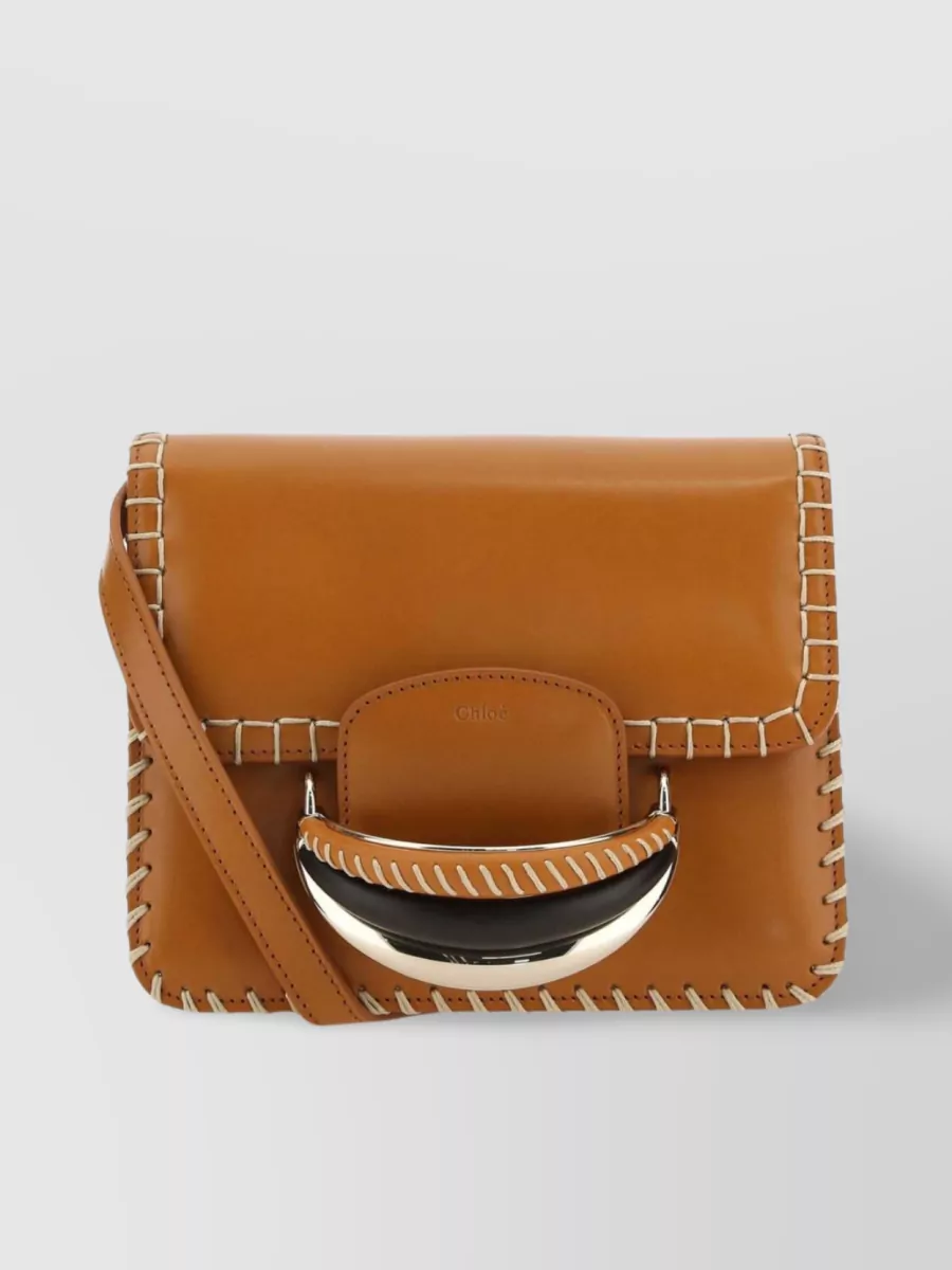 Shop Chloé Leather Clutch With Chain And Stitching In Brown