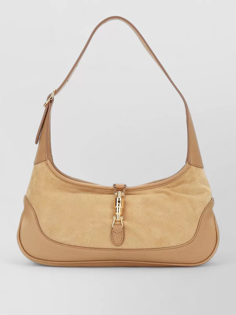 Gucci jackie 1961 leather clutch bag — The Gucci sand baguette bag in suede and leather ties into the nude-blush story of the shoes and skirt while giving a structured, polished finish that still reads relaxed.