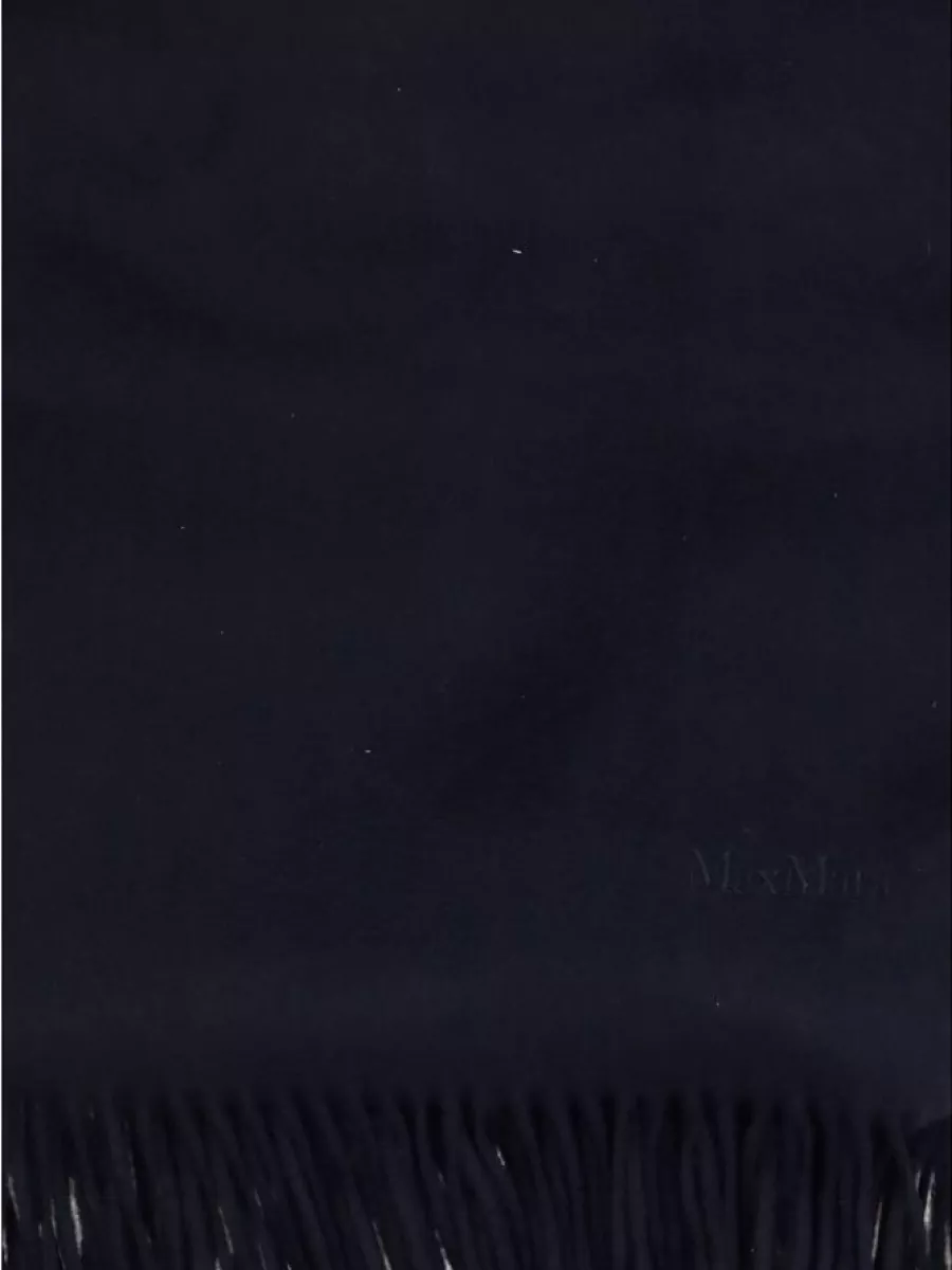 Max Mara Cashmere scarf — The ink-navy Max Mara scarf deepens the monochrome story around the face and can be worn loose for a long vertical line that complements the ruched top and high waist.