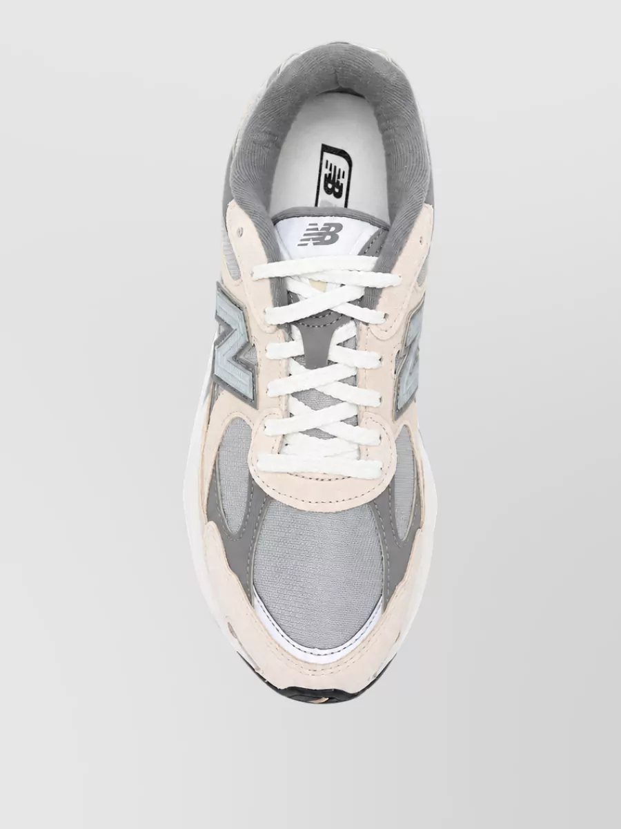 New Balance Paneled Low-Top Sneakers