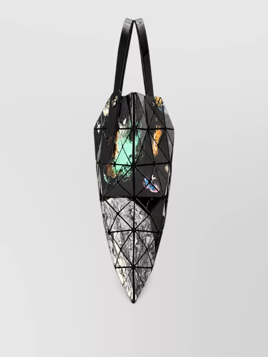 Bao Bao Issey Miyake Cosmic tote bag — Bao Bao tote C continues the Issey Miyake story with geometric structure and a dark, inky palette that plays well with the skirt’s jewel tones without adding clashing colour.