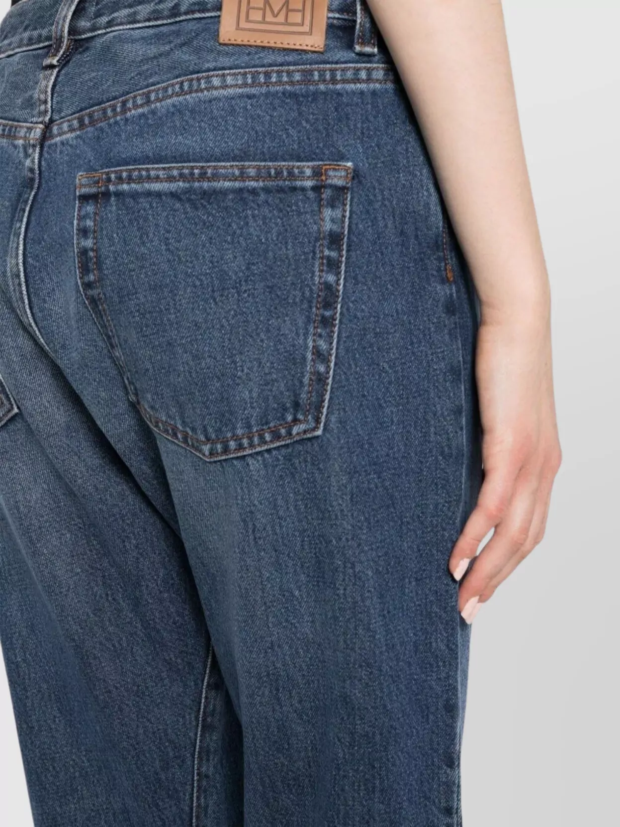 Totême Twisted Seam Denim Trousers