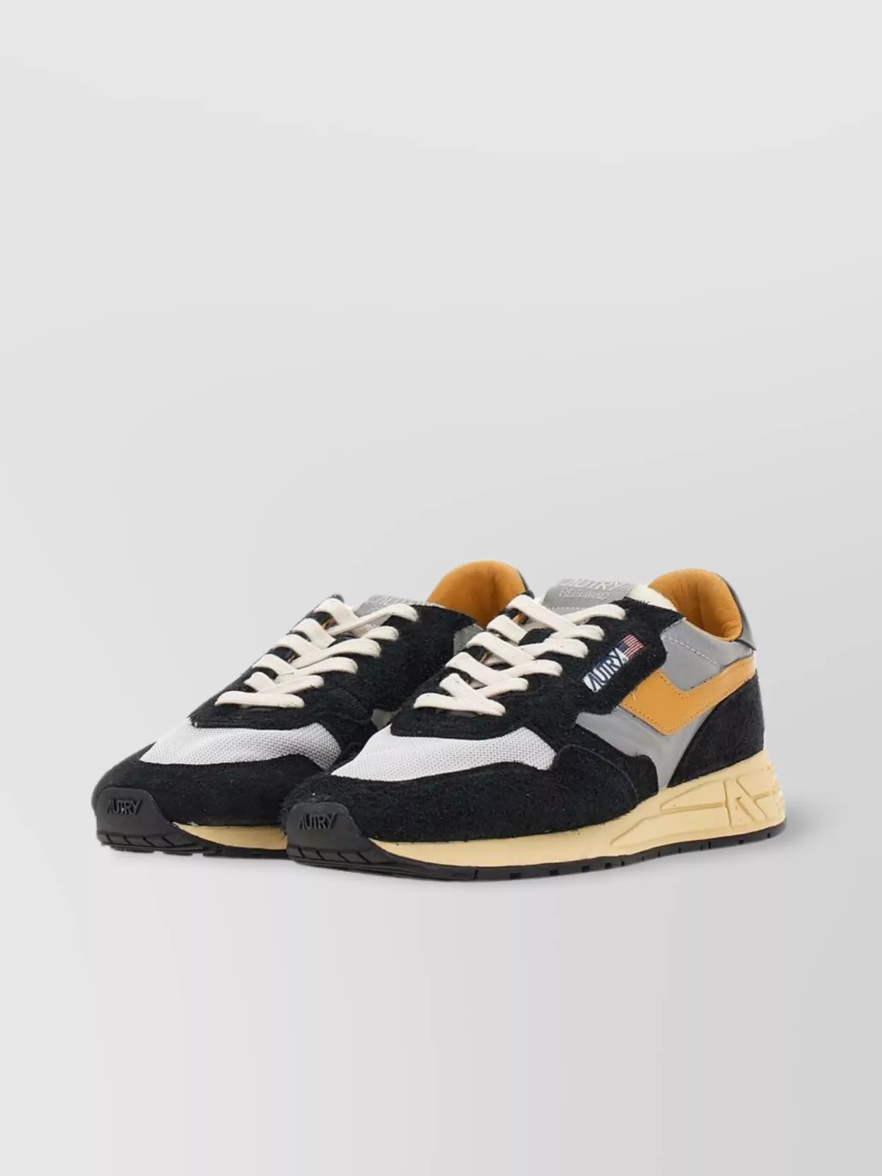 Autry Low Sneaker With Contrast Stitching And Mesh Panels