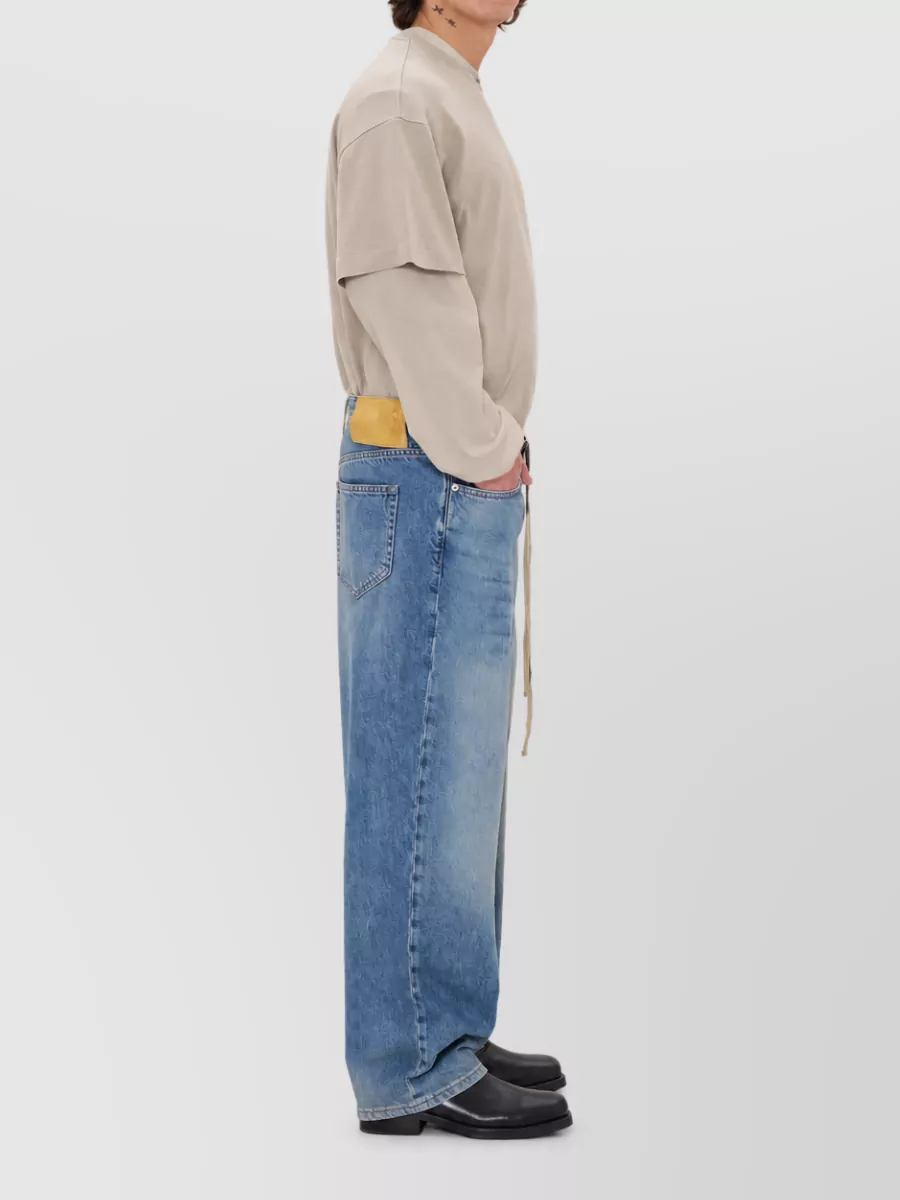 Haikure High-rise wide-leg denim jeans