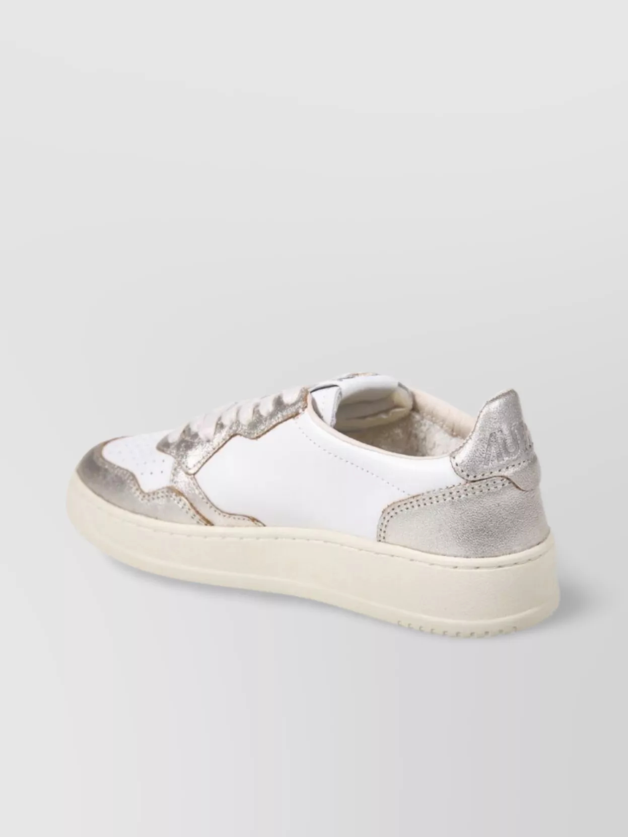 Autry Low Sneaker With Metallic Accents And Perforated Detailing