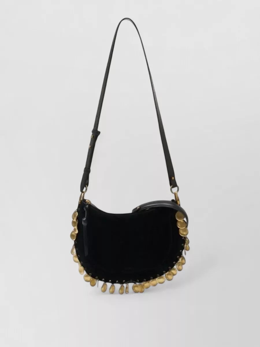 Isabel Marant oskan soft leather shoulder bag — The black Themoiré pleated pouch keeps the palette tight, adds modern structure against the soft skirt, and matches the outfit’s day-to-night minimal romantic energy.