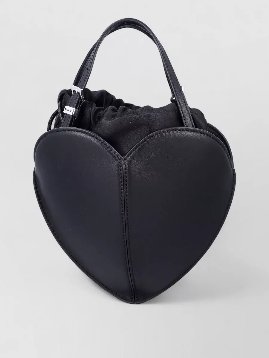 Rotate leather heart bag