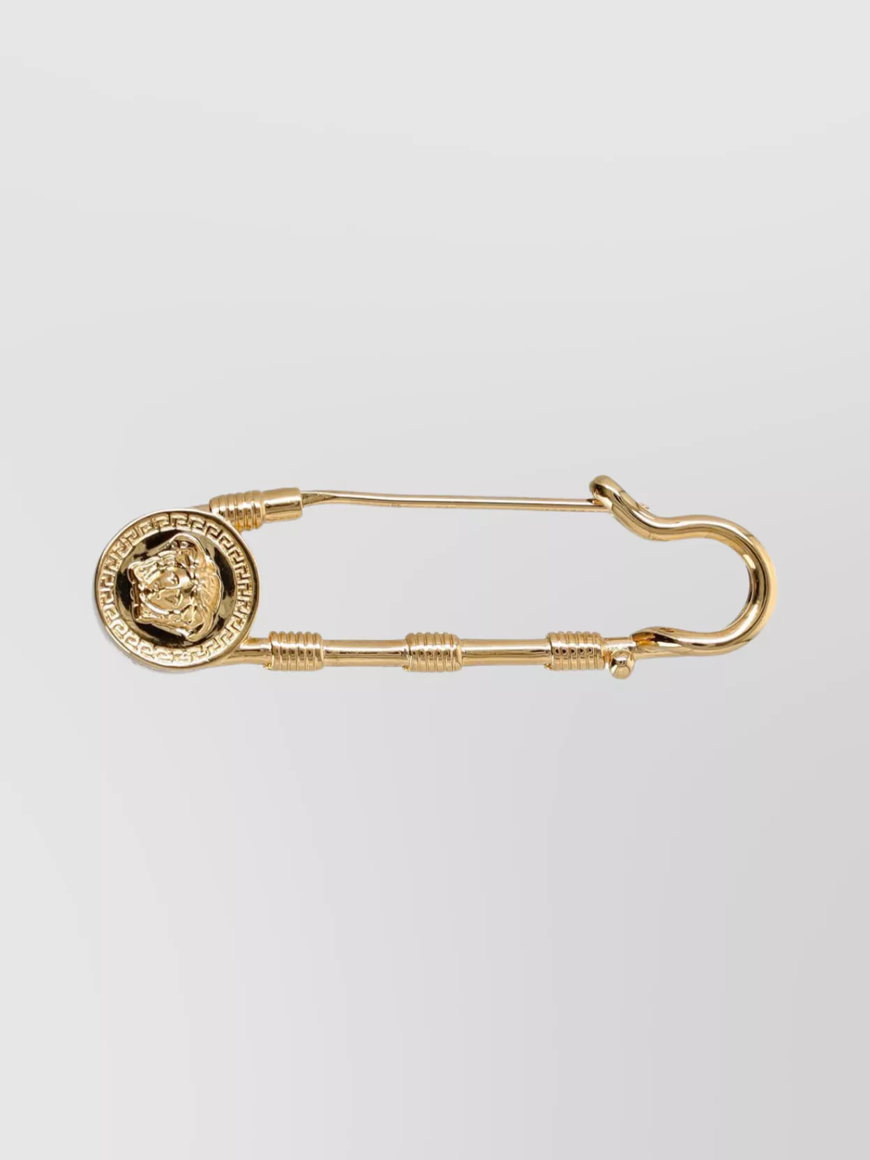 Versace Engraved Medallion Safety Pin Brooch In Gold