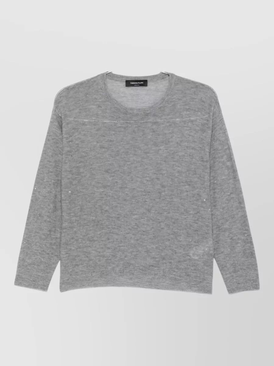 Fabiana Filippi Wool sequin-embellished fine-knit crewneck sweater — The heather-grey sparkle sweatshirt keeps the palette tonal with the lounge trousers, adds just enough polish for quiet coffee-run dressing, and matches their relaxed yet refined mood.