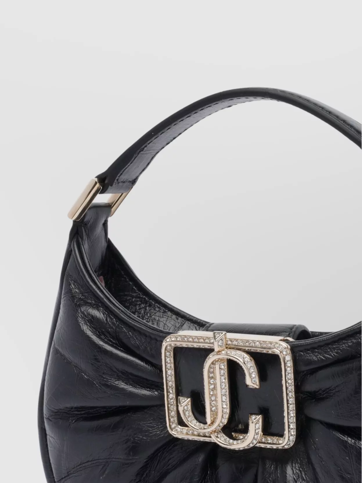 JIMMY CHOO HOBO BAG WITH METALLIC ACCENTS AND TOP HANDLE