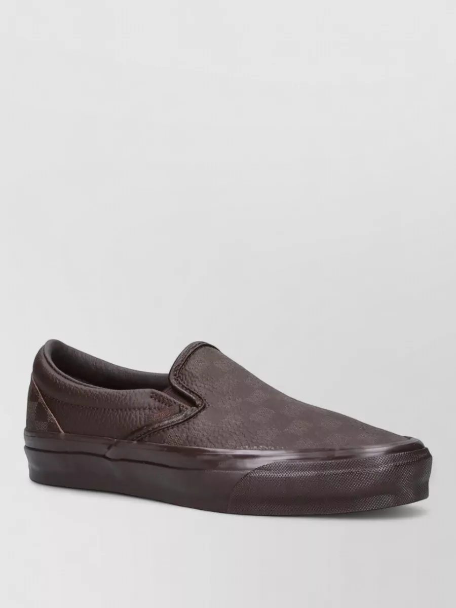 Vans leather checkerboard slip-on sneakers